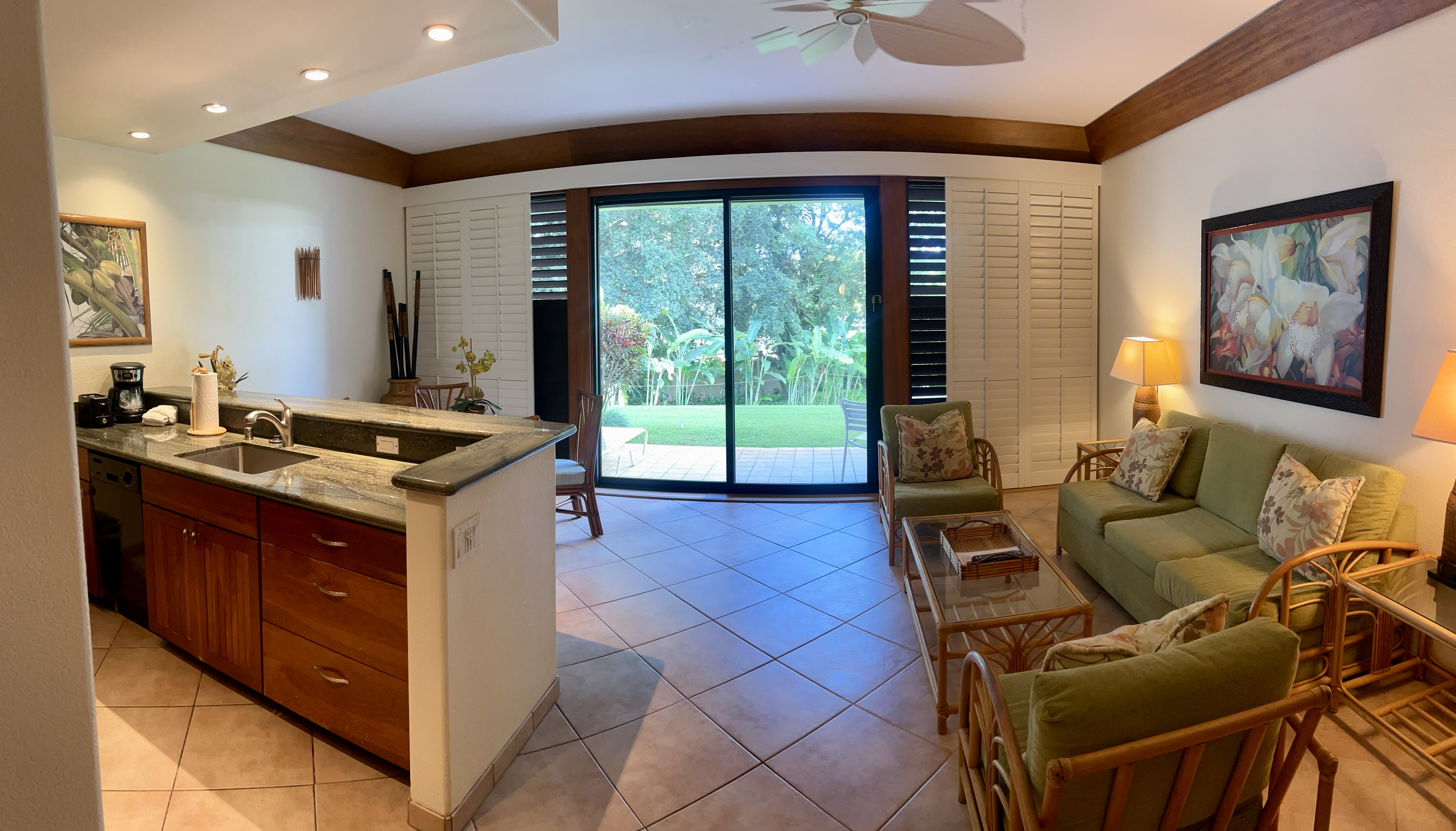 2253 Poipu Road, Unit 421 Koloa, HI 96756 - Photo 11 of 11 a kitchen with a stove a sink and a refrigerator