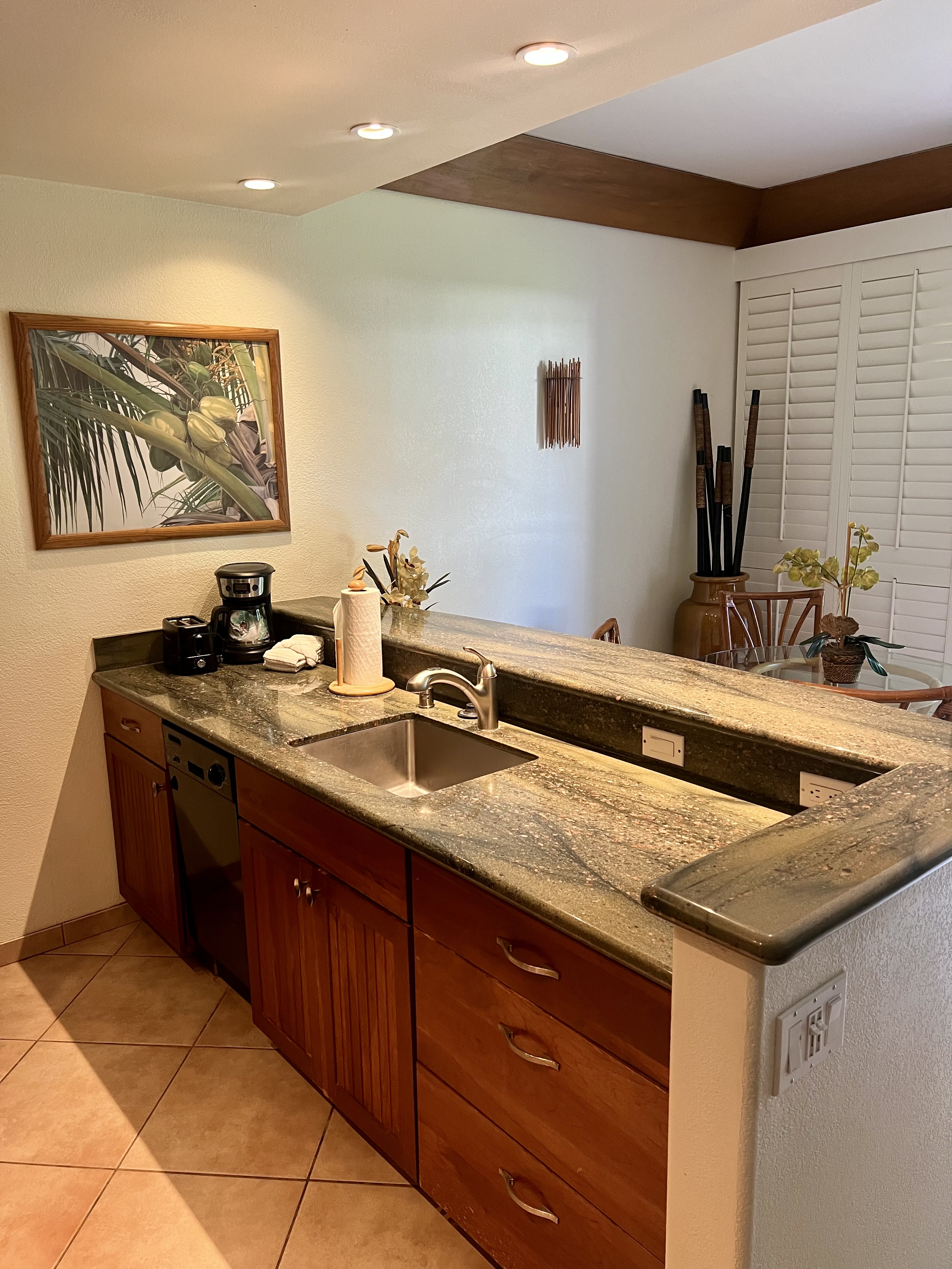 2253 Poipu Road, Unit 421 Koloa, HI 96756 - Photo 7 of 11 a bathroom with a sink and a mirror