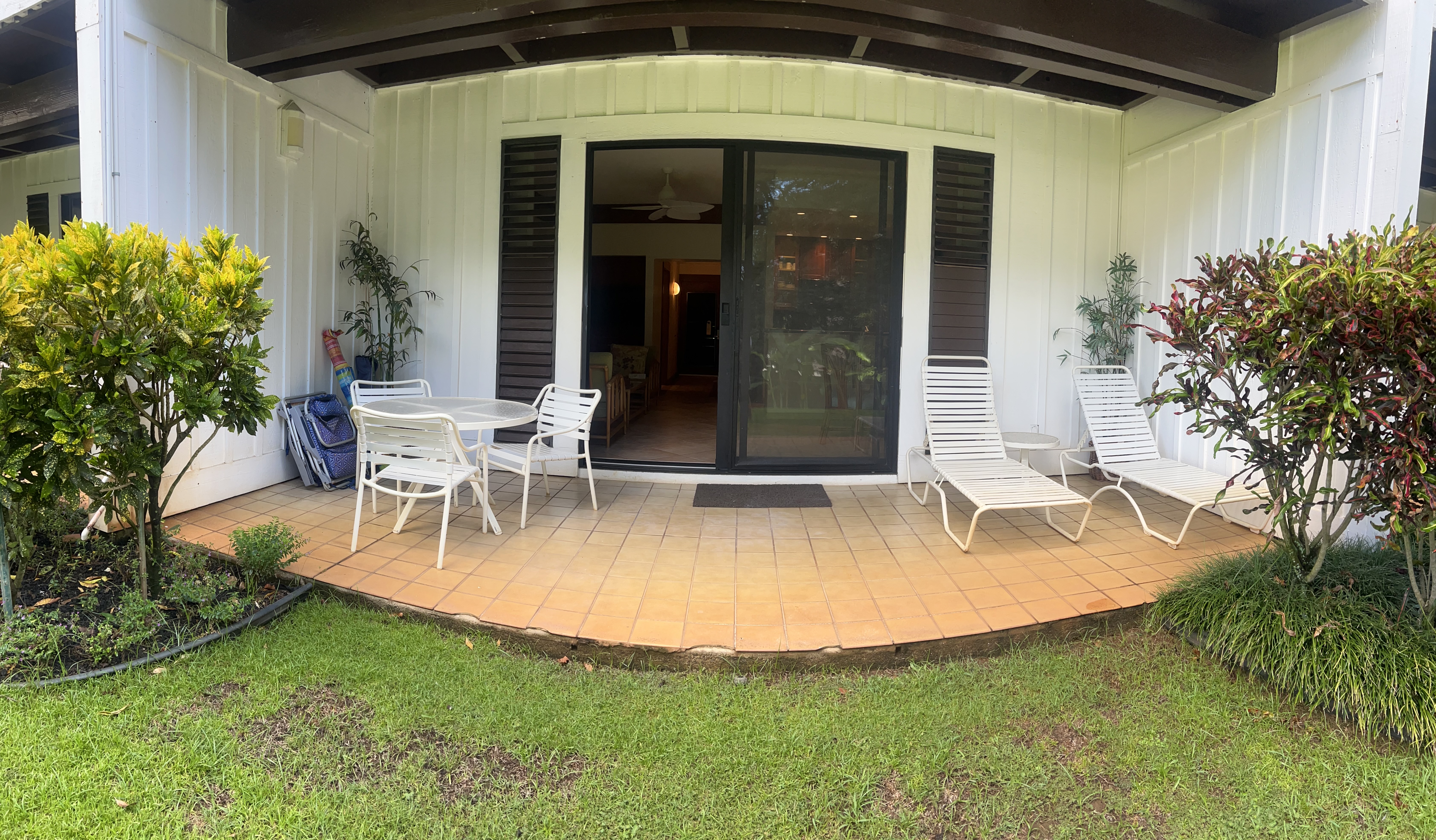 2253 Poipu Road, Unit 421 Koloa, HI 96756 - Photo 9 of 11 a view of a house with swimming pool and sitting area