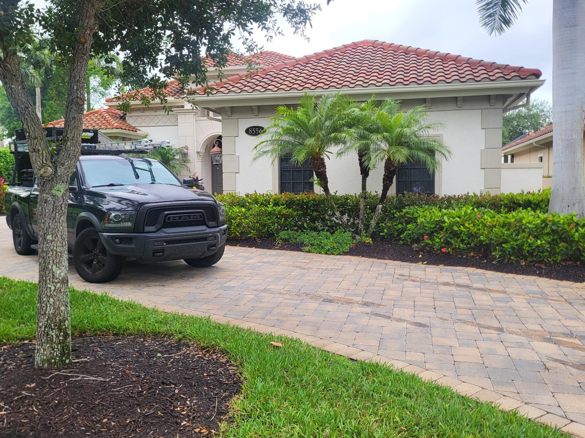 8556 Majorca Lane Naples, FL 34114 - Photo 1 of 1 a front view of a house with garden