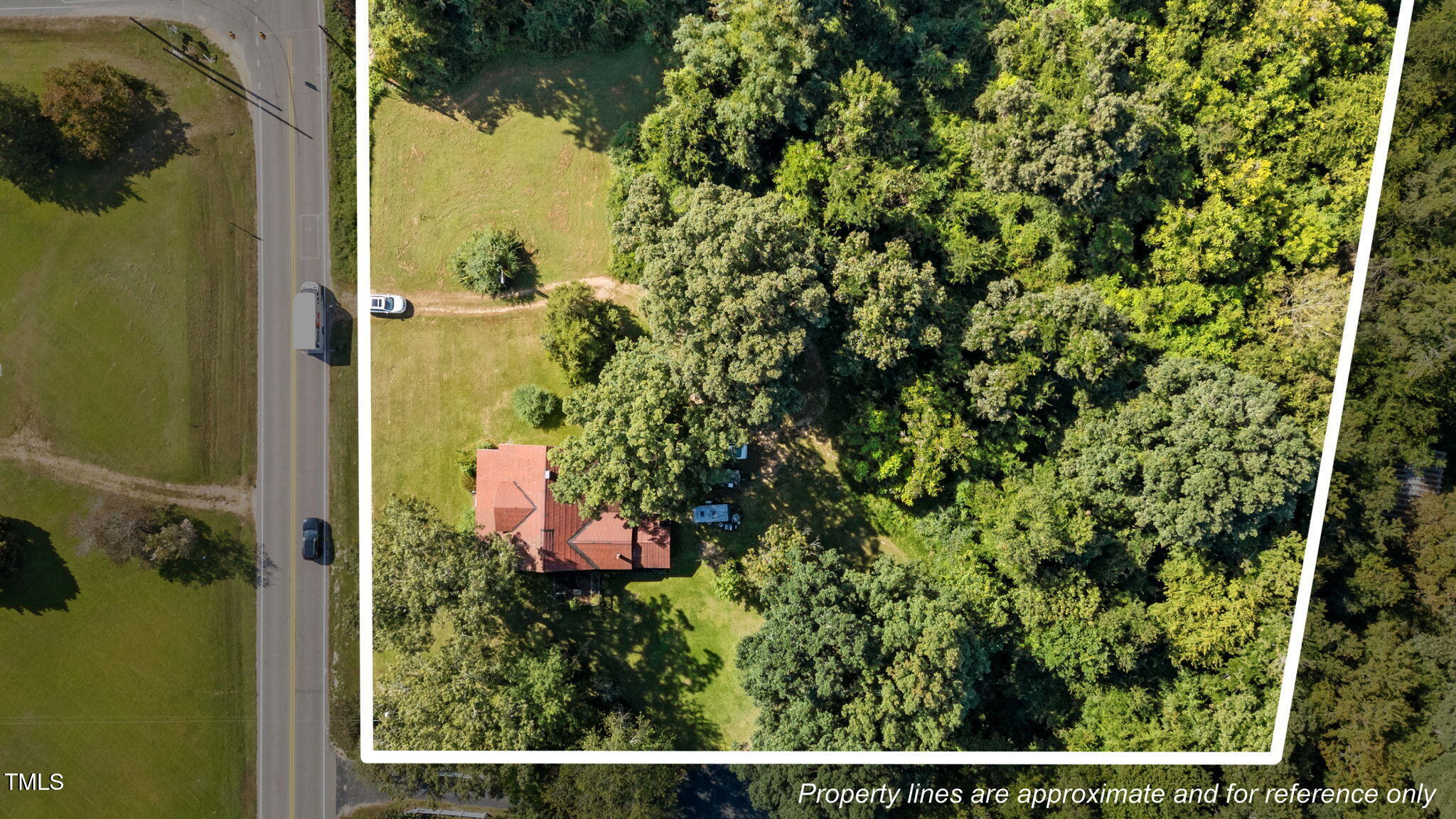 4316 Forestville Road Raleigh, NC 27616 - Photo 3 of 13 18-web-or-mls-DJI_20250905101128_0146_D