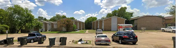 a view of parked car with city street