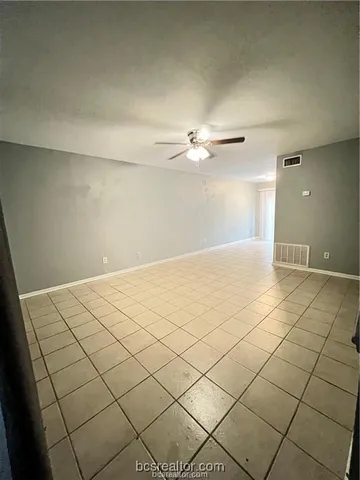 a view of a room with windows