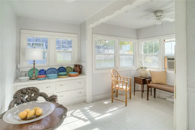 a workspace with furniture and window