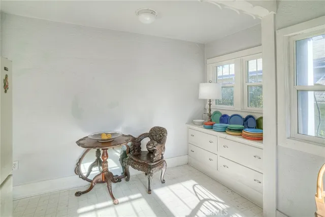 a room with furniture and a window