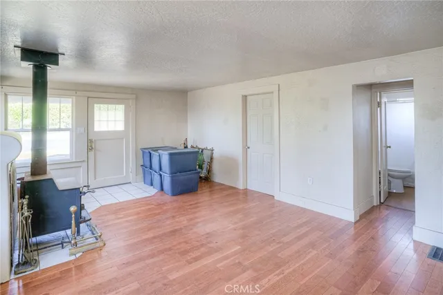 a room that has a bed and a table in it