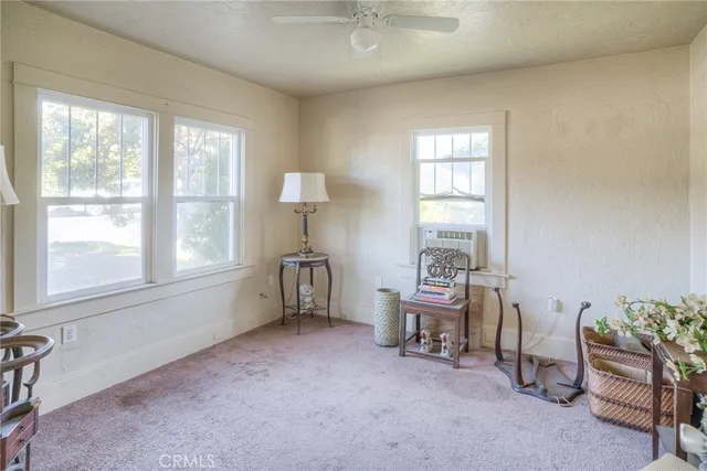 a room with furniture and a window
