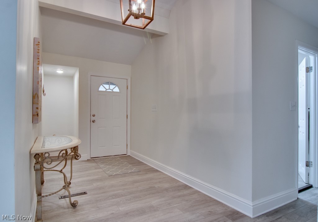 351 Edmore Road Akron, OH 44333 - Photo 3 of 35 Entering into the foyer. All fresh, new paint, flooring, lighting, doors, baseboards ... and more.