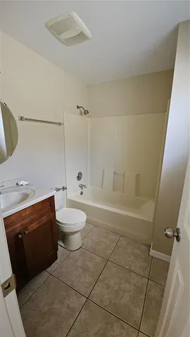 a view of an empty room and window in a room