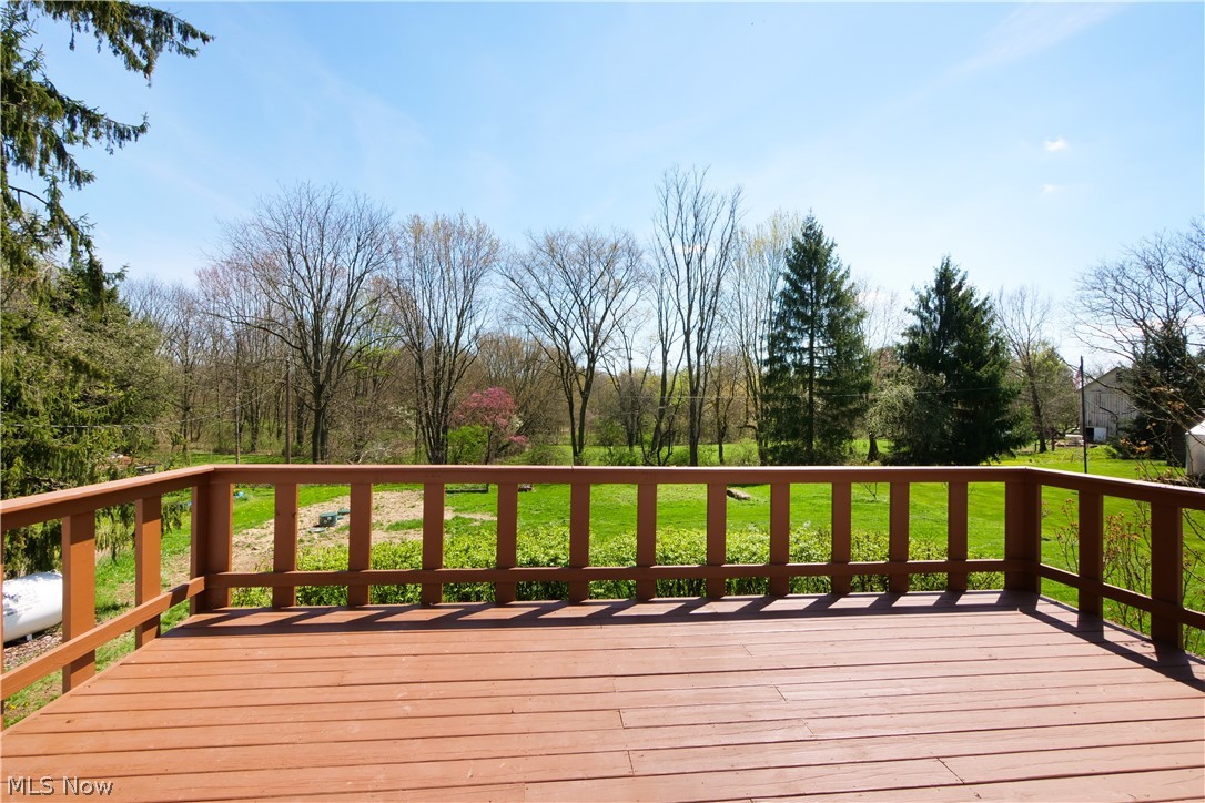 12379 Portage Street Rittman, OH 44270 - Photo 34 of 44 Wooden terrace with a lawn