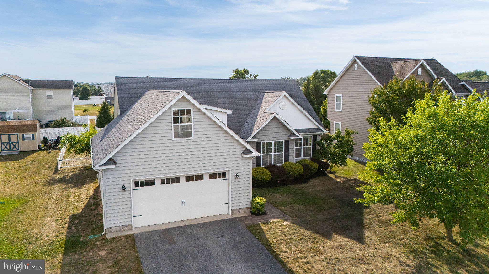 27 Sun Ridge Drive Felton, DE 19943 - Photo 5 of 61 Charming home with lush greenery.