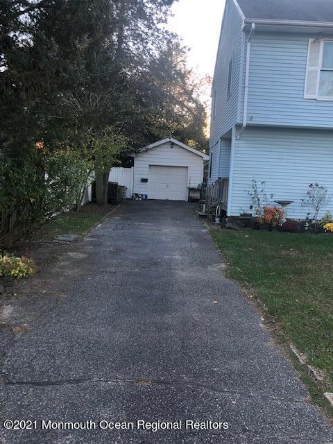 307 Sudbury Road Point Pleasant, NJ 08742 - Photo 12 of 19 a view of a house with a back yard