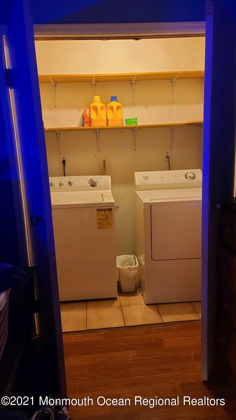 307 Sudbury Road Point Pleasant, NJ 08742 - Photo 16 of 19 a utility room with washer and dryer