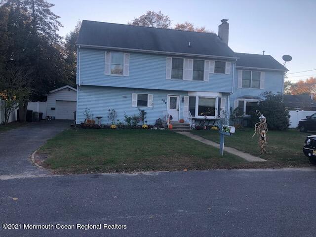 307 Sudbury Road Point Pleasant, NJ 08742 - Photo 3 of 19 a view of a house with a yard