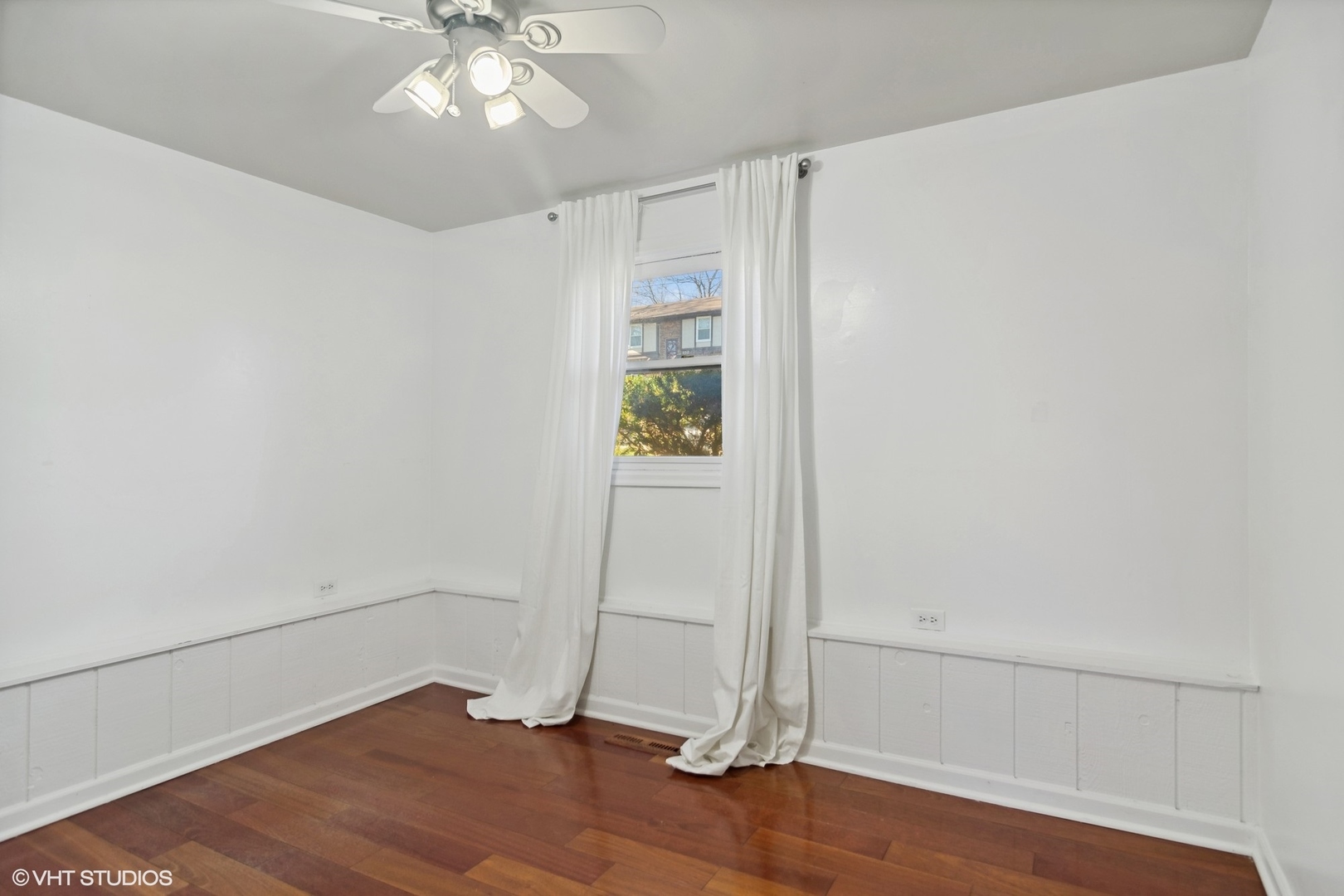 245 Thomas Street Cary, IL 60013 - Photo 16 of 28 wooden floor in an empty room with a window