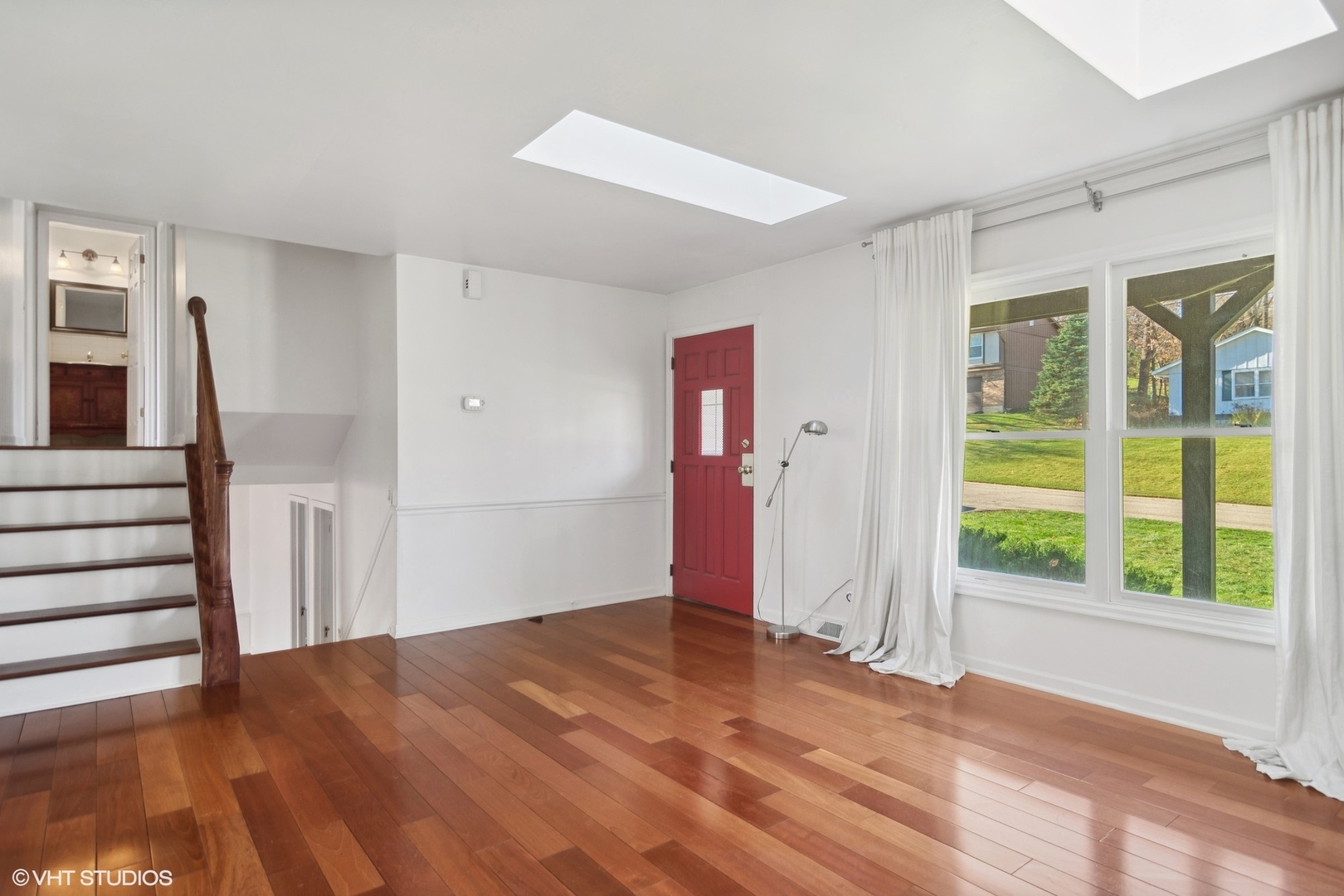 245 Thomas Street Cary, IL 60013 - Photo 2 of 28 a view of an empty room with a window