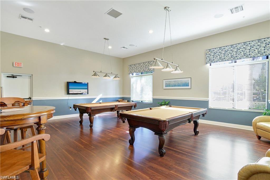 19633 Villa Rosa Loop Estero, FL 33967 - Photo 43 of 50 Playroom with pool table and dark hardwood / wood-style flooring