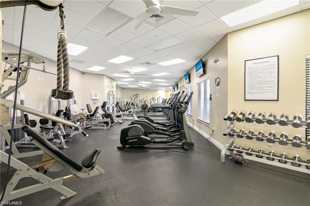 19633 Villa Rosa Loop Estero, FL 33967 - Photo 45 of 50 Exercise room featuring a paneled ceiling and ceiling fan