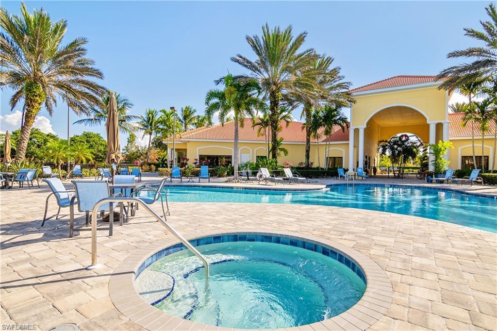 19633 Villa Rosa Loop Estero, FL 33967 - Photo 47 of 50 View of swimming pool featuring a community hot tub and a patio area