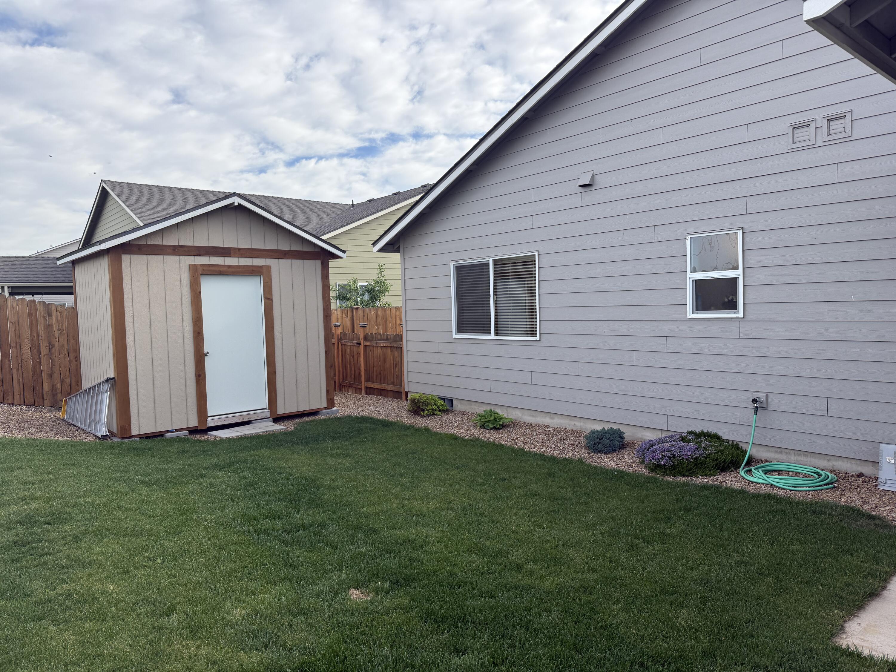 1225 Northwest Willow Parkway Road Madras, OR 97741 - Photo 27 of 31 Work shed next to gate entry of RV parking area