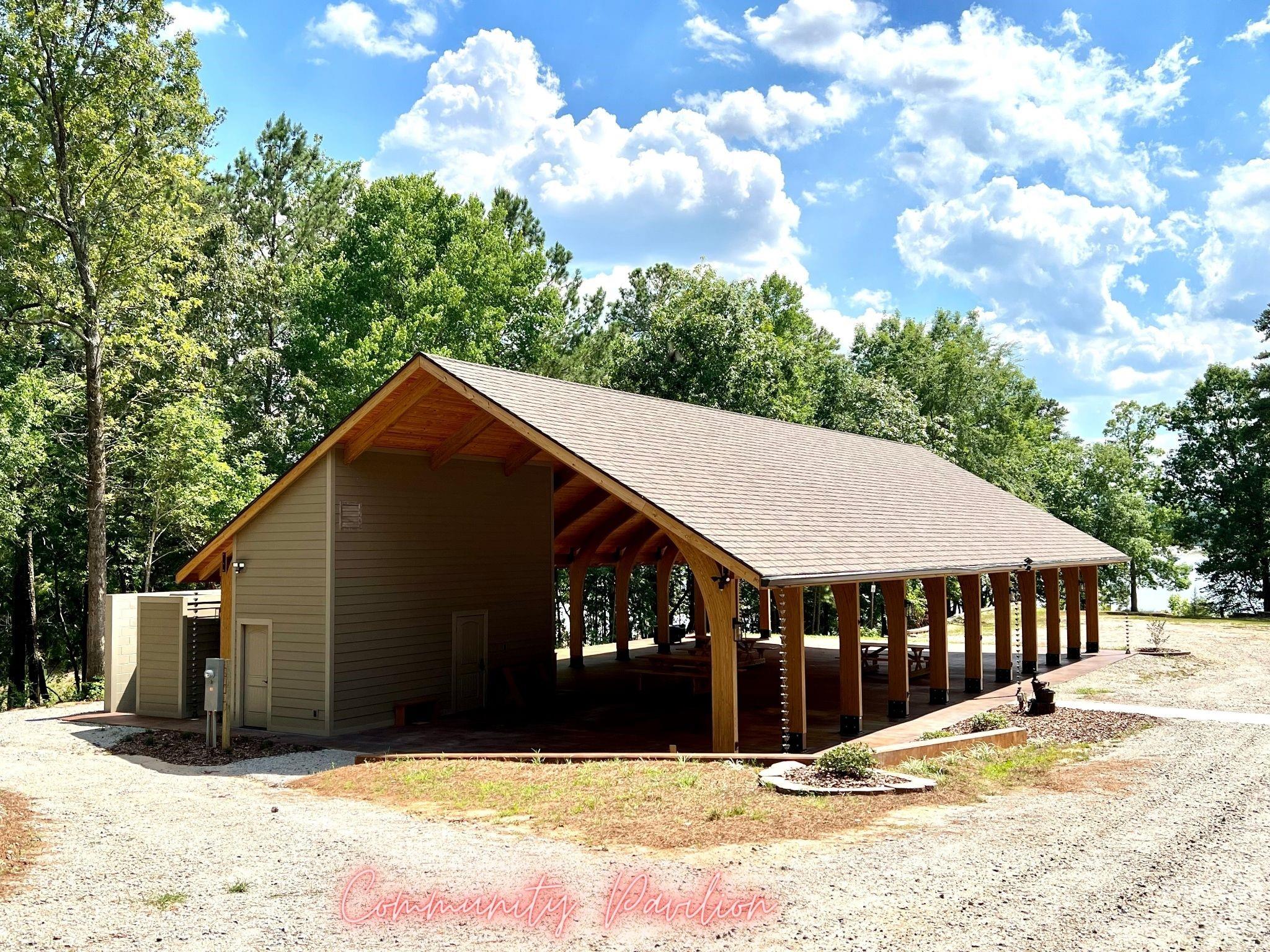 Lot 8 Blewett Falls Road, Unit 8 Rockingham, NC 28379 - Photo 6 of 15 a front view of a house with a yard