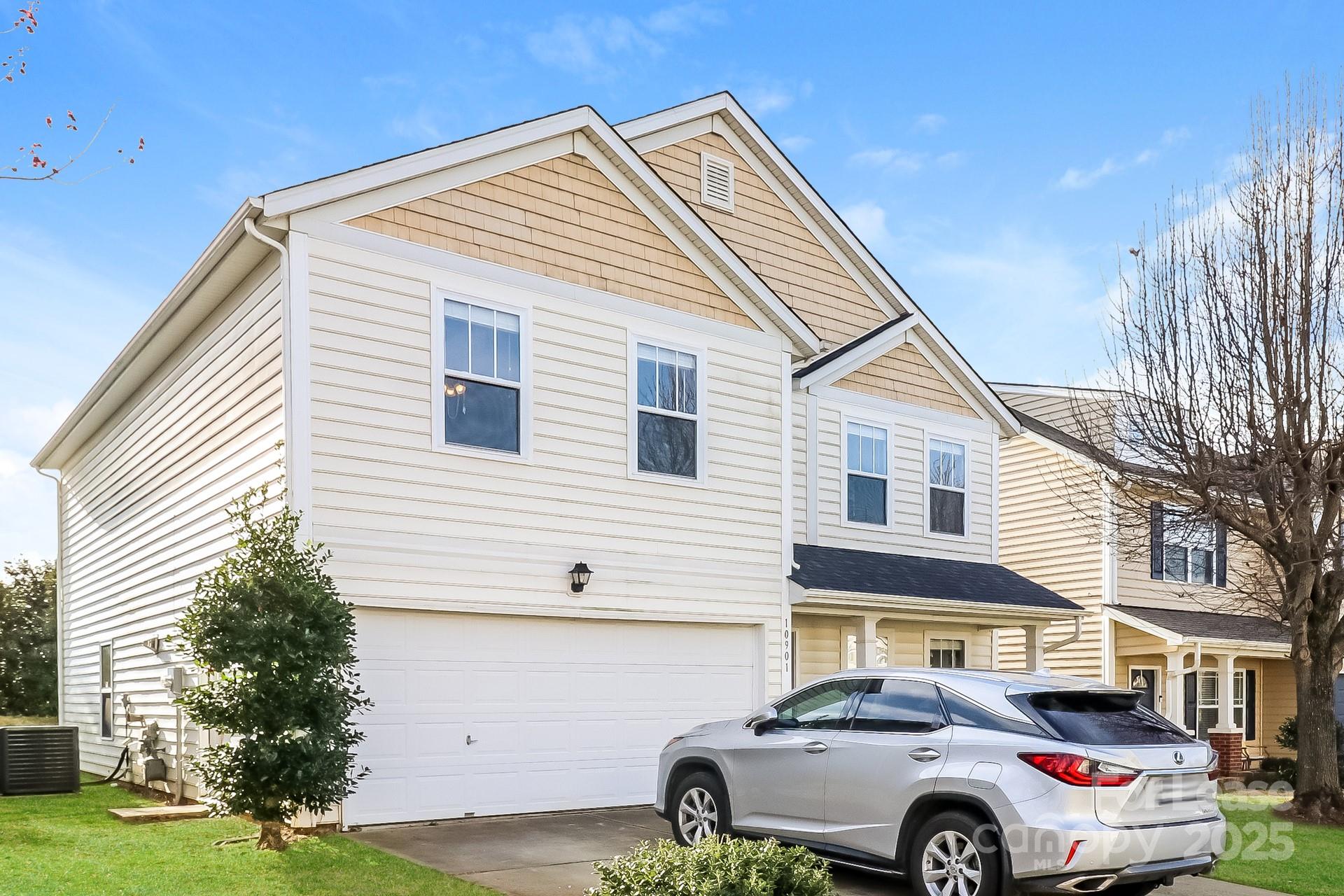 10901 Slalom Hill Road Charlotte, NC 28278 - Photo 3 of 17 a car parked in front of a house