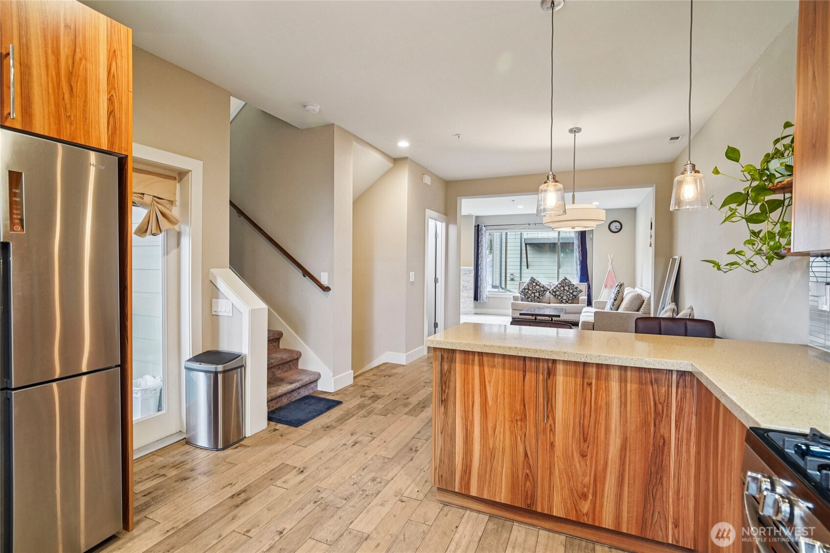301 South 47th Street, Unit B Renton, WA 98055 - Photo 14 of 32 a view of a kitchen with kitchen island a counter top space and stainless steel appliances