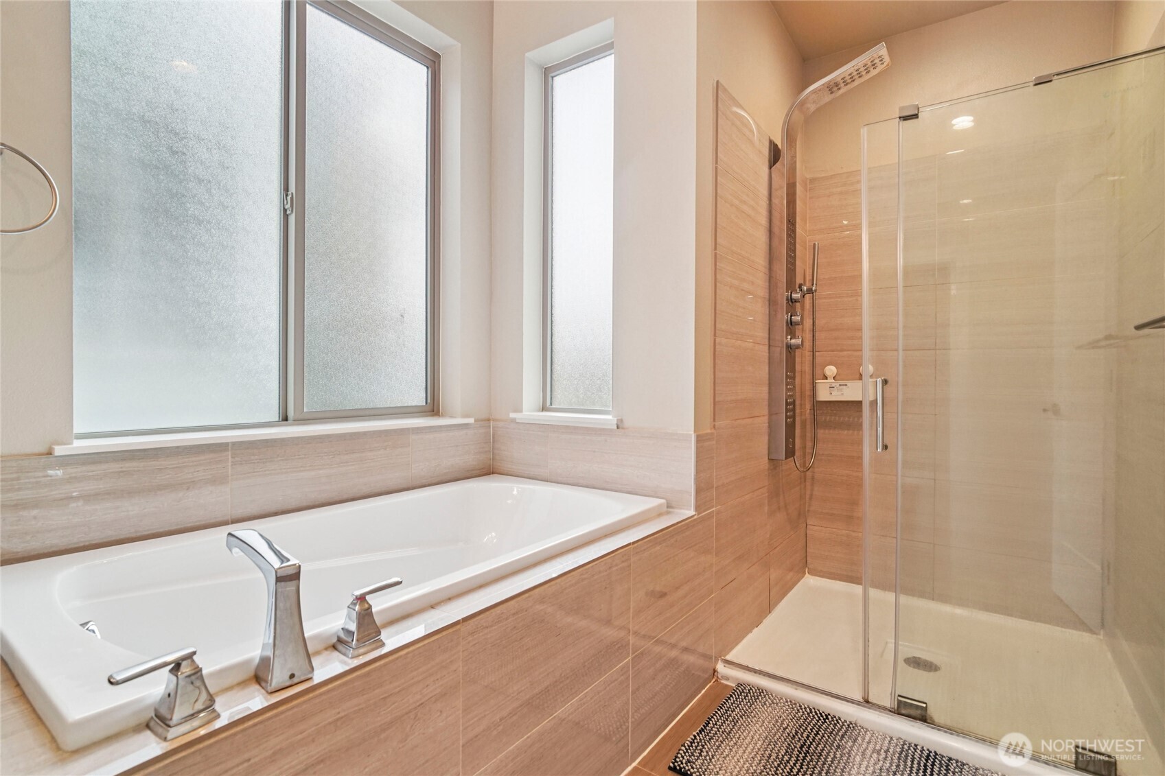 301 South 47th Street, Unit B Renton, WA 98055 - Photo 20 of 32 a bathroom with a bathtub and a shower