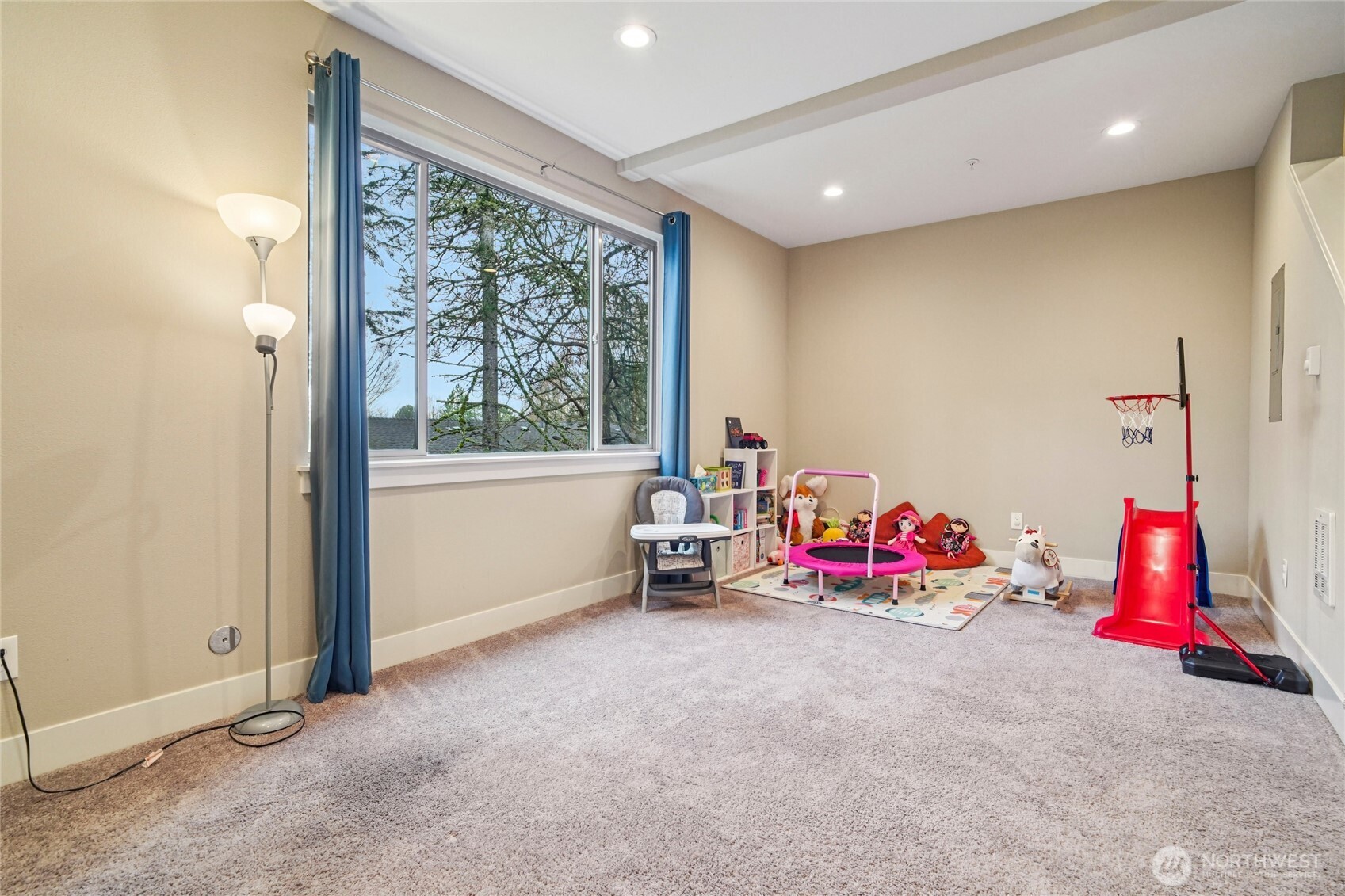 301 South 47th Street, Unit B Renton, WA 98055 - Photo 26 of 32 a room with toys and white walls