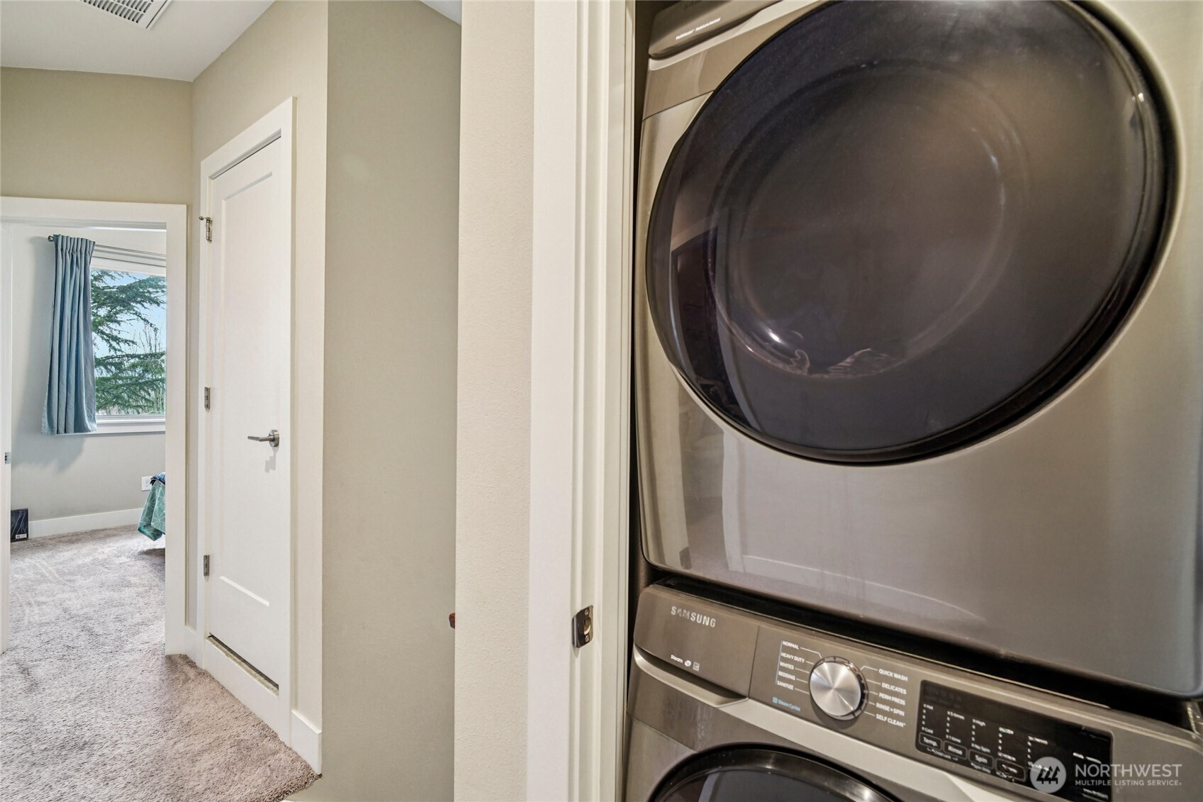 301 South 47th Street, Unit B Renton, WA 98055 - Photo 28 of 32 a view of a hallway with washer and dryer