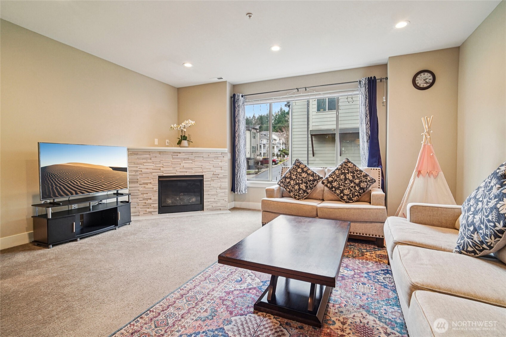 301 South 47th Street, Unit B Renton, WA 98055 - Photo 3 of 32 a living room with furniture and a fireplace