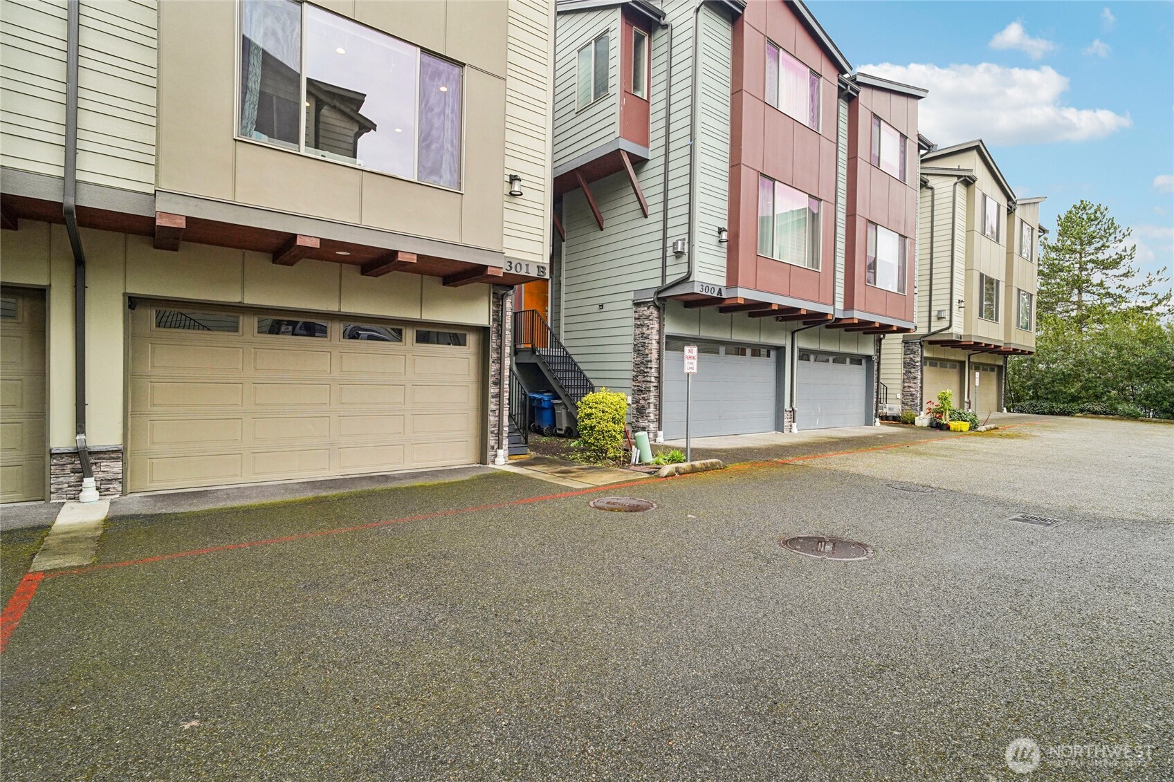 301 South 47th Street, Unit B Renton, WA 98055 - Photo 31 of 32 a view of a street with building