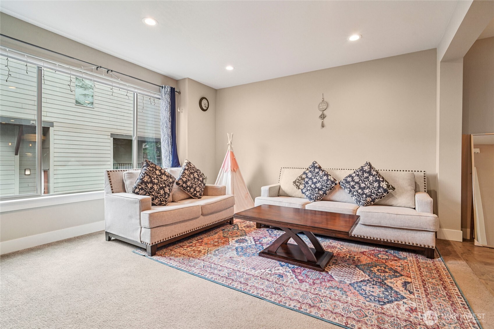 301 South 47th Street, Unit B Renton, WA 98055 - Photo 4 of 32 a living room with furniture and a potted plant