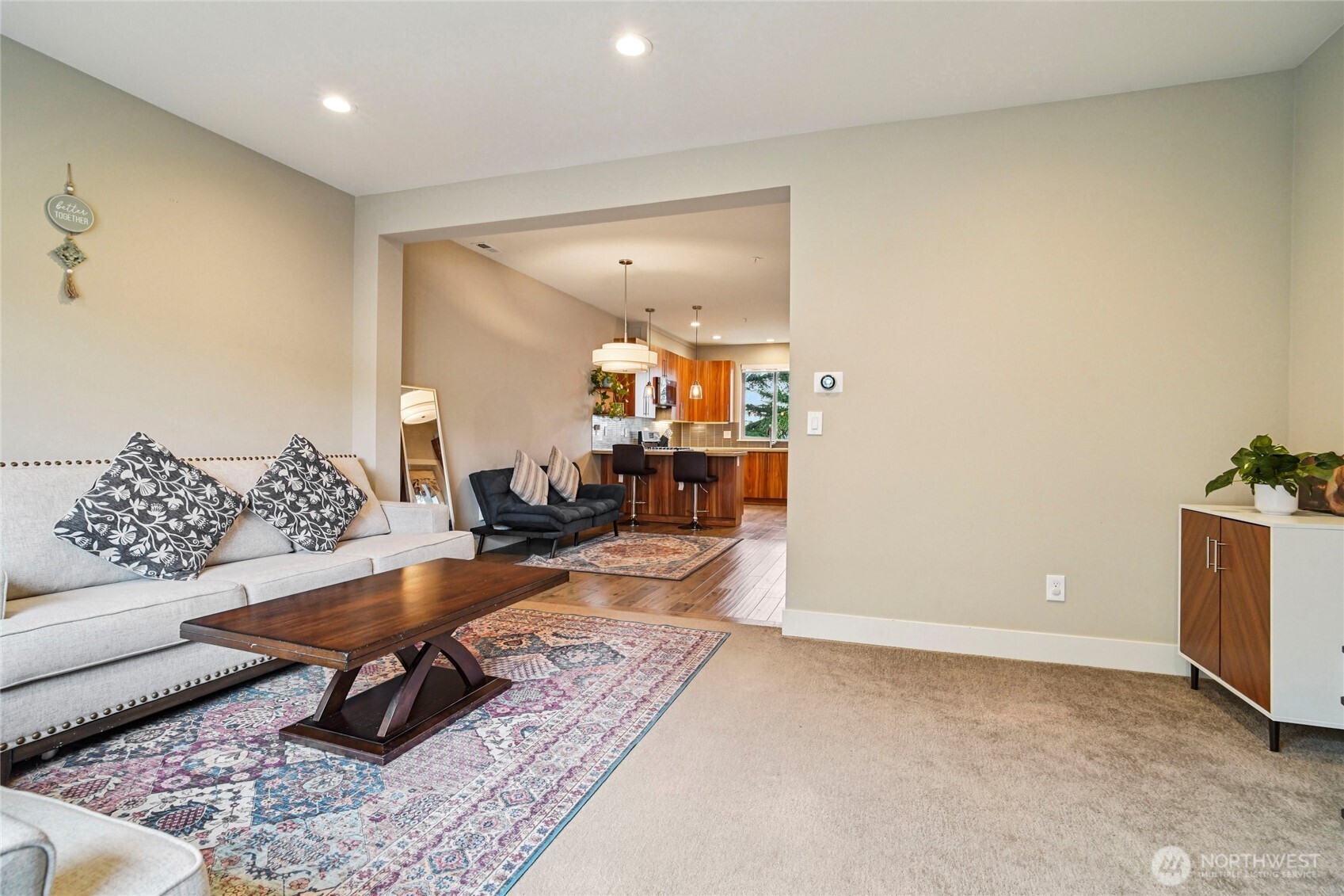 301 South 47th Street, Unit B Renton, WA 98055 - Photo 5 of 32 a living room with furniture and a table