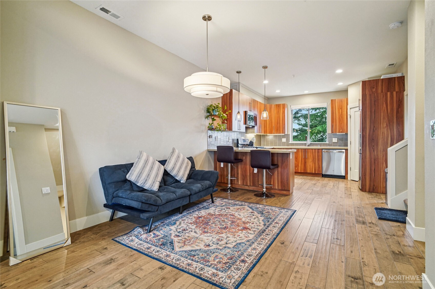 301 South 47th Street, Unit B Renton, WA 98055 - Photo 7 of 32 a living room with a couch and a table
