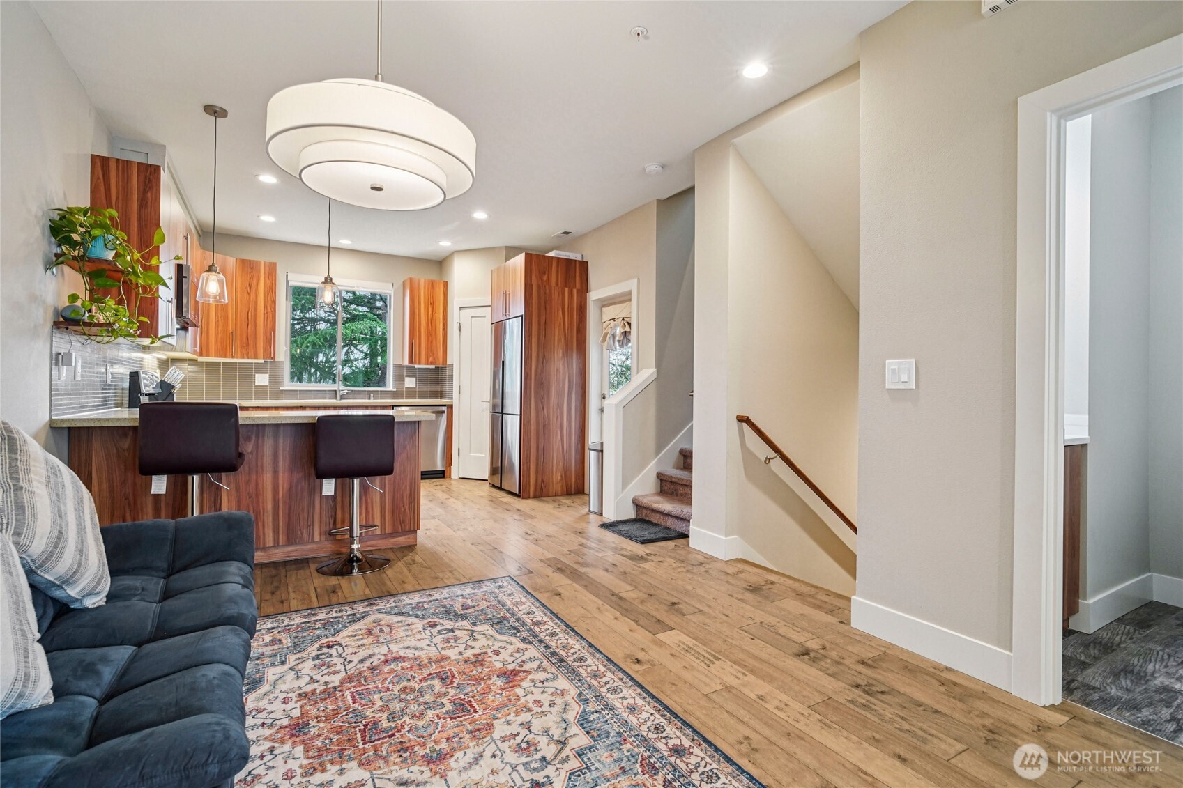 301 South 47th Street, Unit B Renton, WA 98055 - Photo 8 of 32 a living room with furniture and a large window
