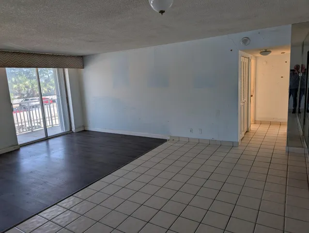 a view of a room with a large window