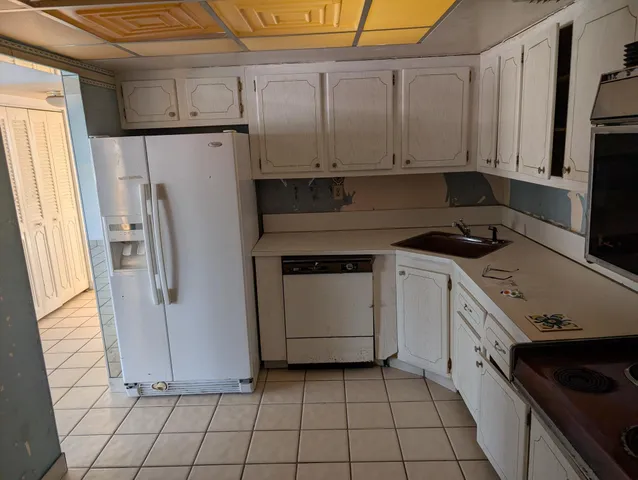 a view of an empty room with a balcony