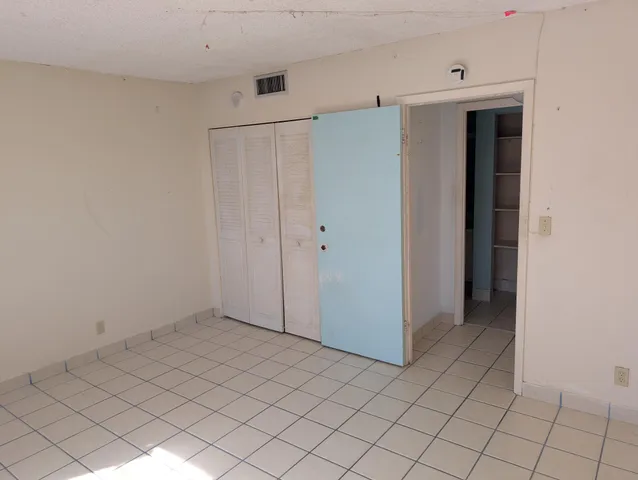 a room with a glass door