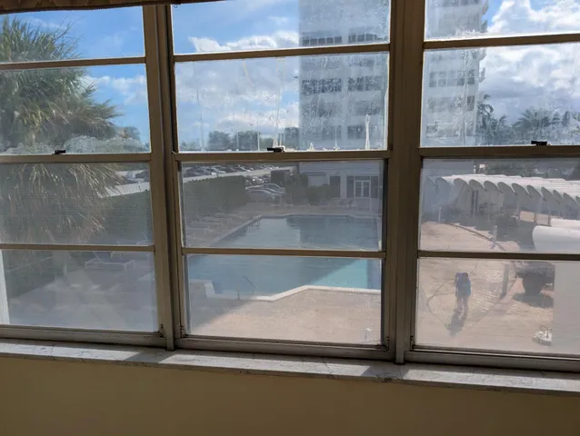 a view of a window with an empty room