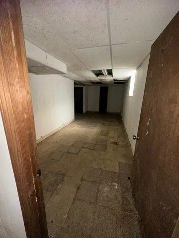 a view of a refrigerator in a room