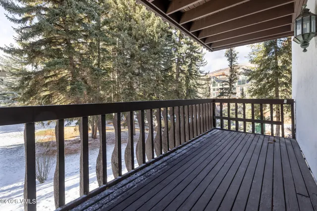 a view of a tree in front of a house