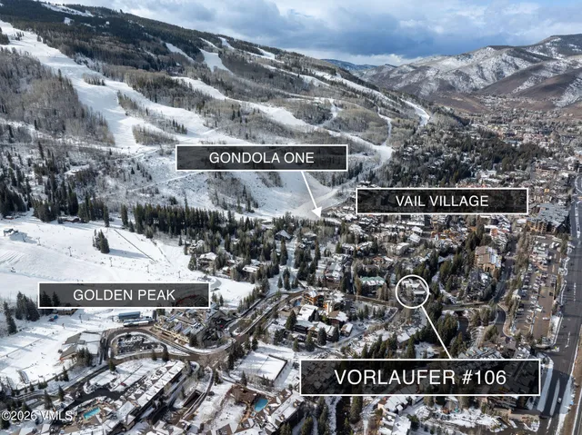 a picture of a wall with a white building