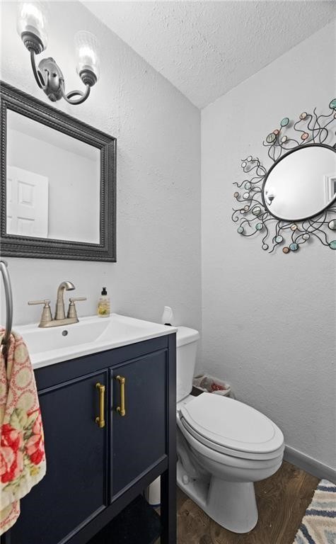 5337 Inverness Drive Corpus Christi, TX 78413 - Photo 15 of 32 a bathroom with a granite countertop toilet sink mirror and vanity