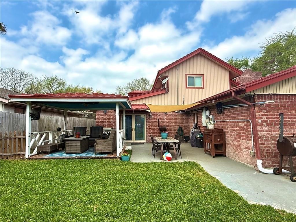 5337 Inverness Drive Corpus Christi, TX 78413 - Photo 25 of 32 a view of a house with backyard and porch