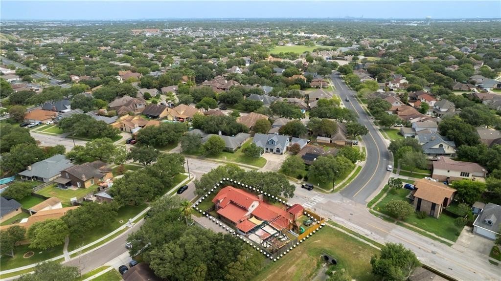5337 Inverness Drive Corpus Christi, TX 78413 - Photo 31 of 32 an aerial view of residential houses with outdoor space and trees
