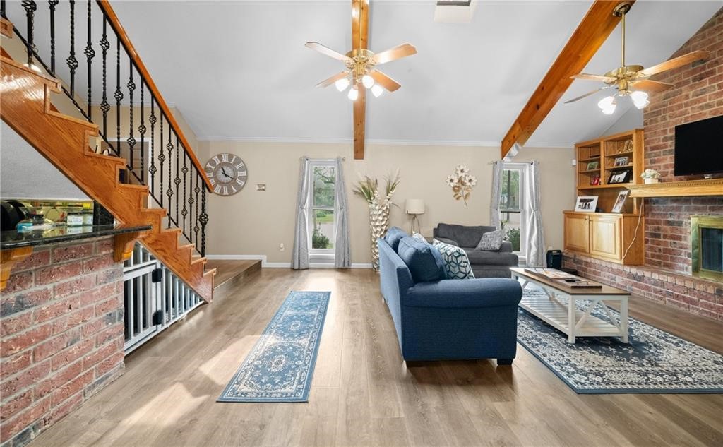 5337 Inverness Drive Corpus Christi, TX 78413 - Photo 7 of 32 a living room with furniture and a fireplace