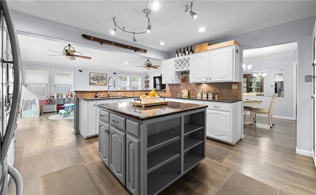 5337 Inverness Drive Corpus Christi, TX 78413 - Photo 9 of 32 a kitchen with a stove a refrigerator and a sink