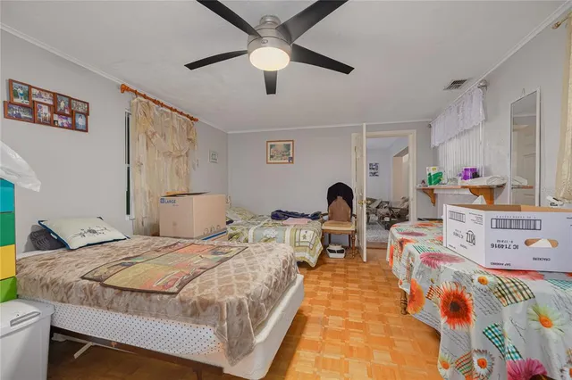 a bed room with a bed and a baby crib