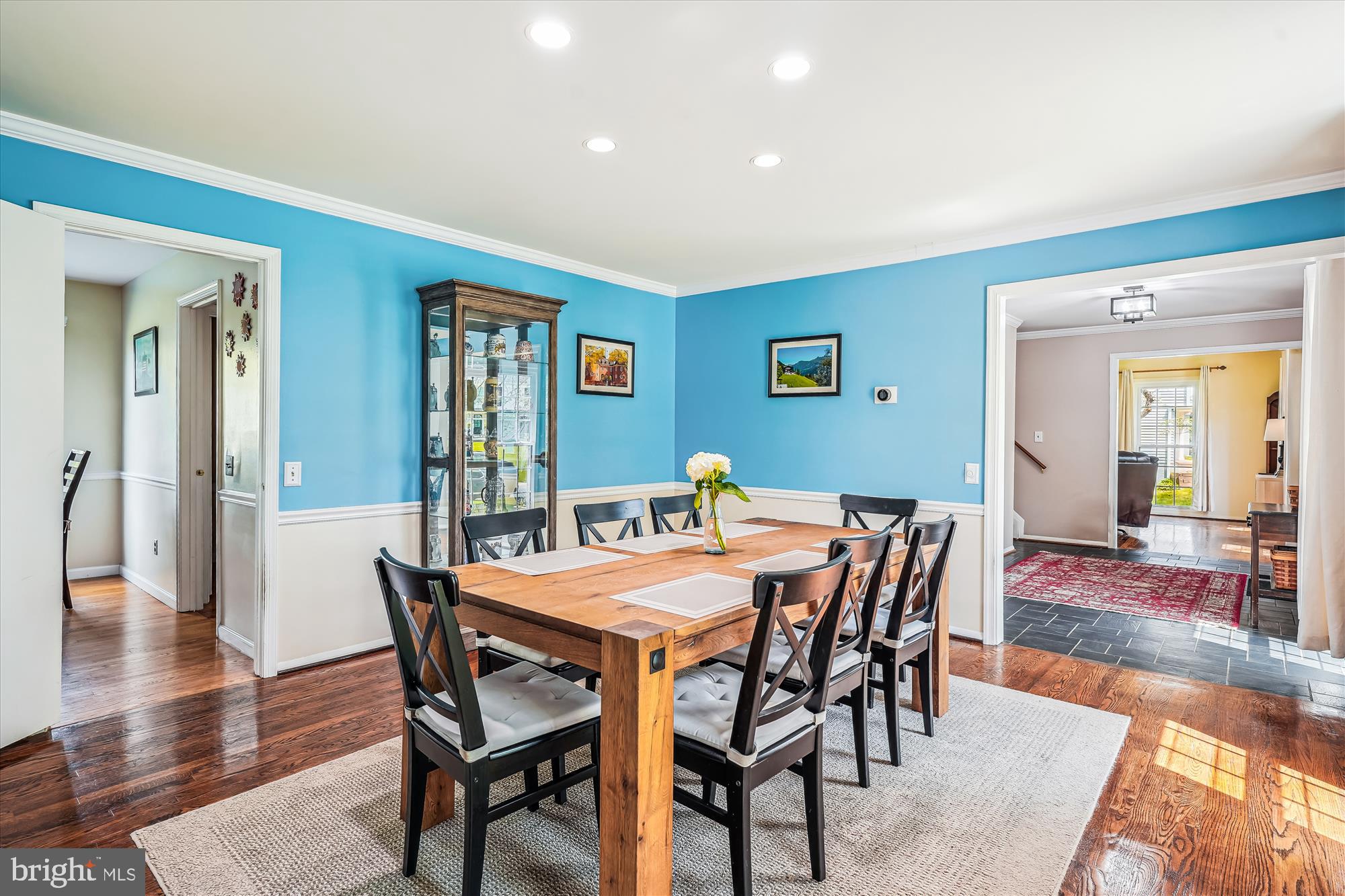 9117 Paddock Lane Potomac, MD 20854 - Photo 14 of 69 a view of a dining room with furniture and wooden floor